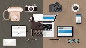 A desk with analog and digital items 